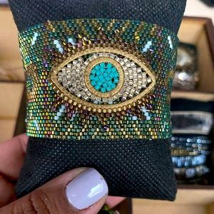 Bracelet brown, green, gold and white